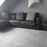 brown leather corner sofa and matching storage footstool ottoman