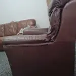 Brown leathet single seater sofa