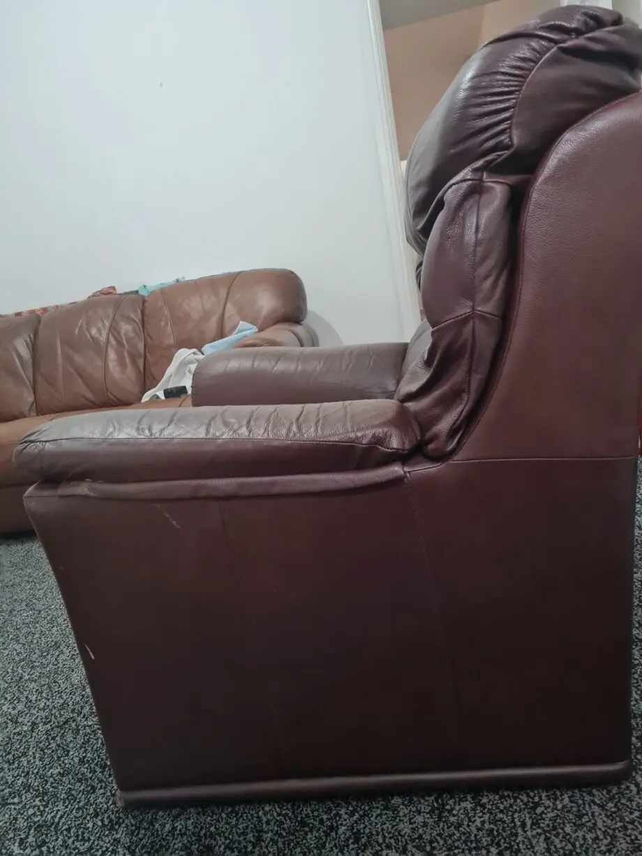Brown leathet single seater sofa