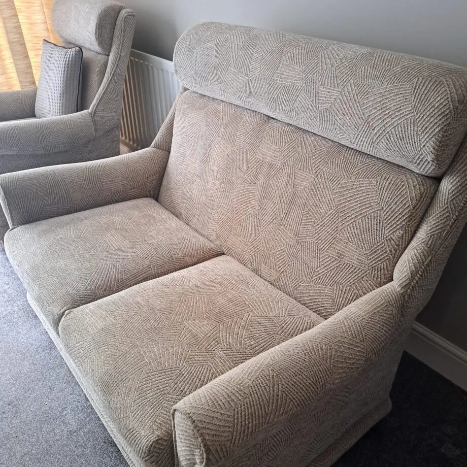 2 seater sofa and 2 chairs with matching footstool