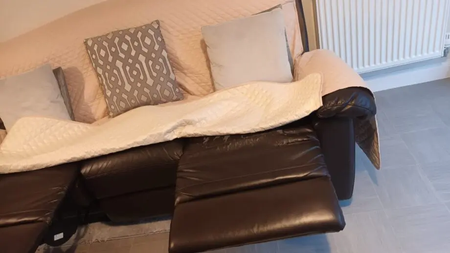EASTER OFFER: Double recliner 3-seater brown faux leather sofa (ARGOS) with sofa cover.