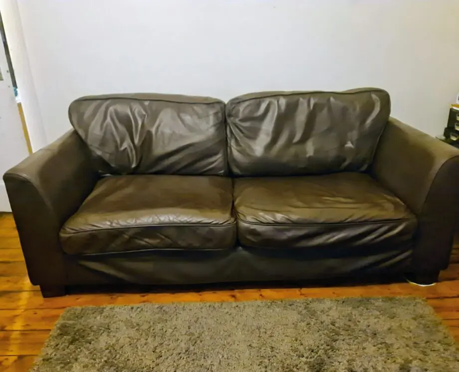 large dark brown genuine leather dfs sofa