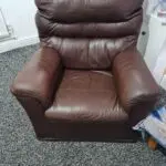 Brown leathet single seater sofa