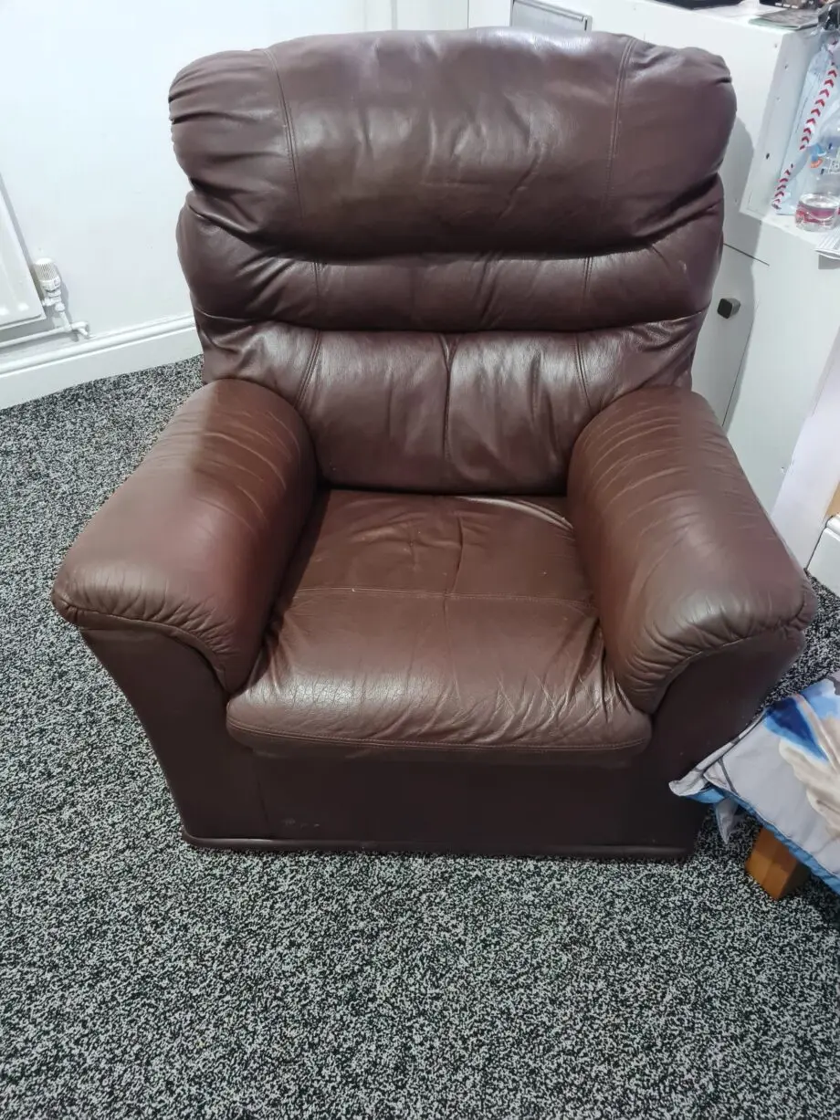 Brown leathet single seater sofa