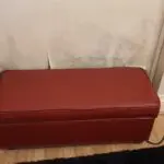 Red 3 seater leather sofa in good state