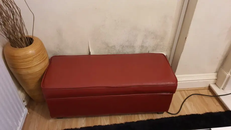 Red 3 seater leather sofa in good state