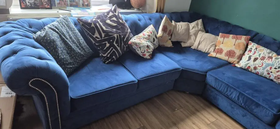 Beautiful blue corner chesterfield sofa