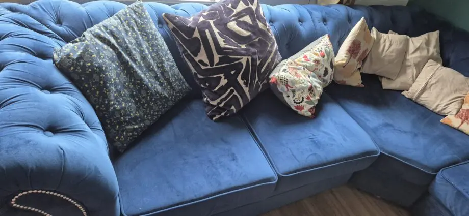 Beautiful blue corner chesterfield sofa