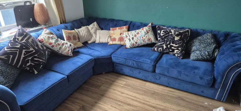 Beautiful blue corner chesterfield sofa