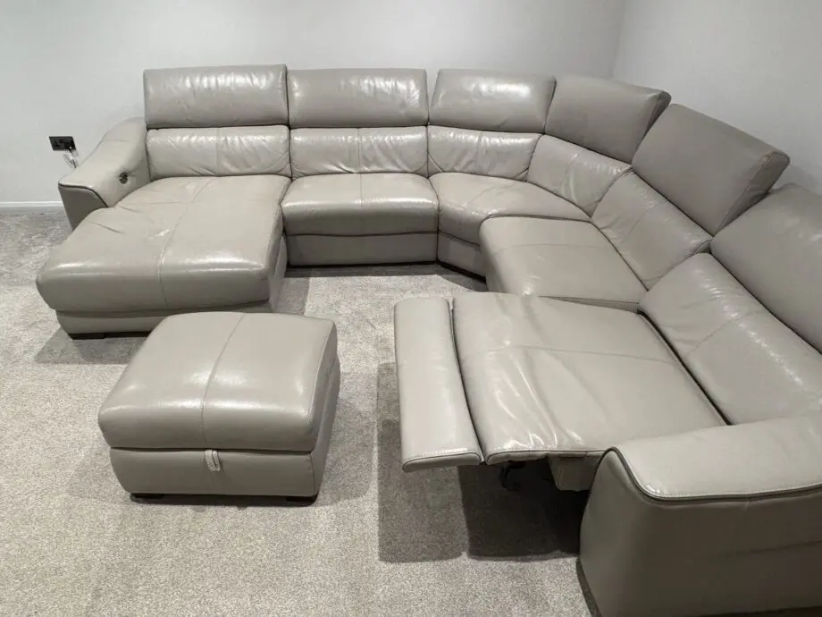 Large grey corner sofa with chaise end