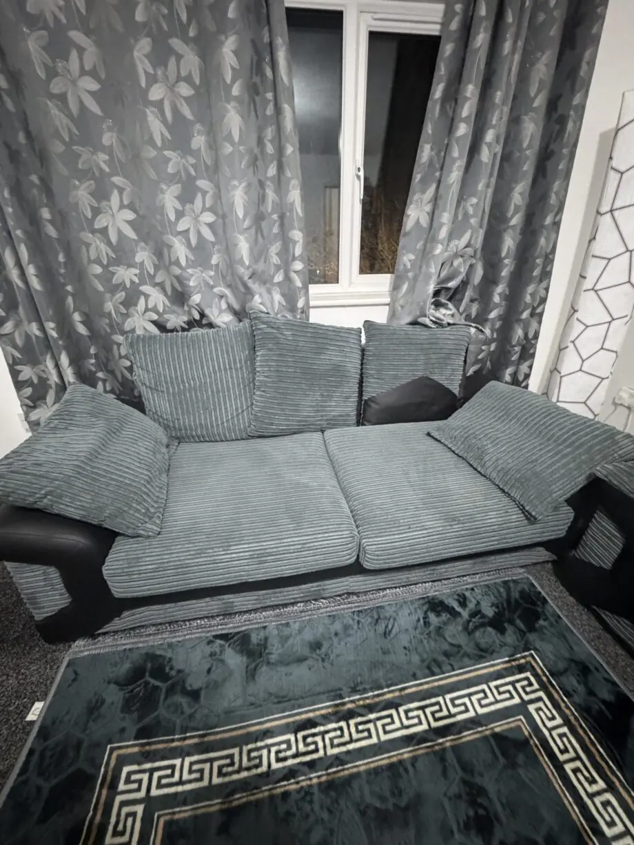 2 of 3 seater black and grey sofa