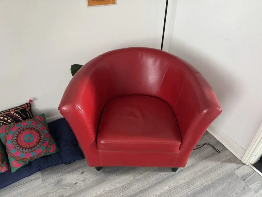 Single seater red sofa chair