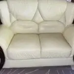 White Leather Sofa with wooden furnishings