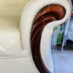 White Leather Sofa with wooden furnishings