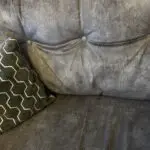 Paisley grey studded sofas and Banquet foot stall