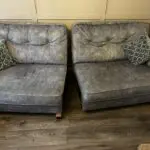 Paisley grey studded sofas and Banquet foot stall
