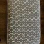 Paisley grey studded sofas and Banquet foot stall