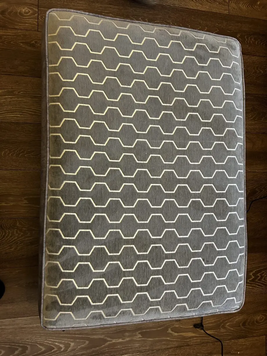 Paisley grey studded sofas and Banquet foot stall