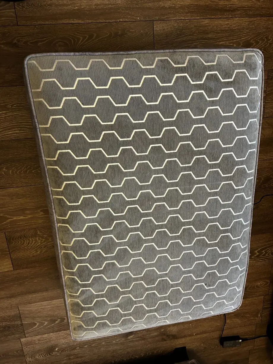 Paisley grey studded sofas and Banquet foot stall