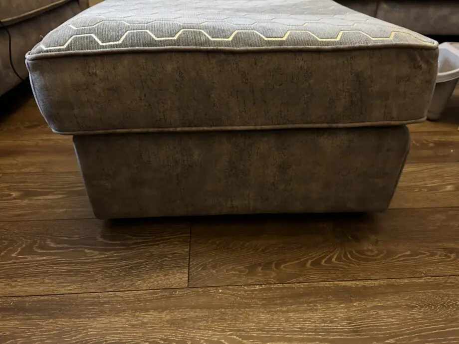 Paisley grey studded sofas and Banquet foot stall