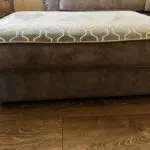Paisley grey studded sofas and Banquet foot stall