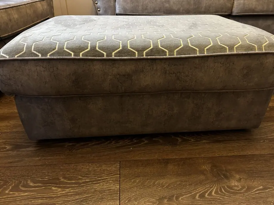 Paisley grey studded sofas and Banquet foot stall