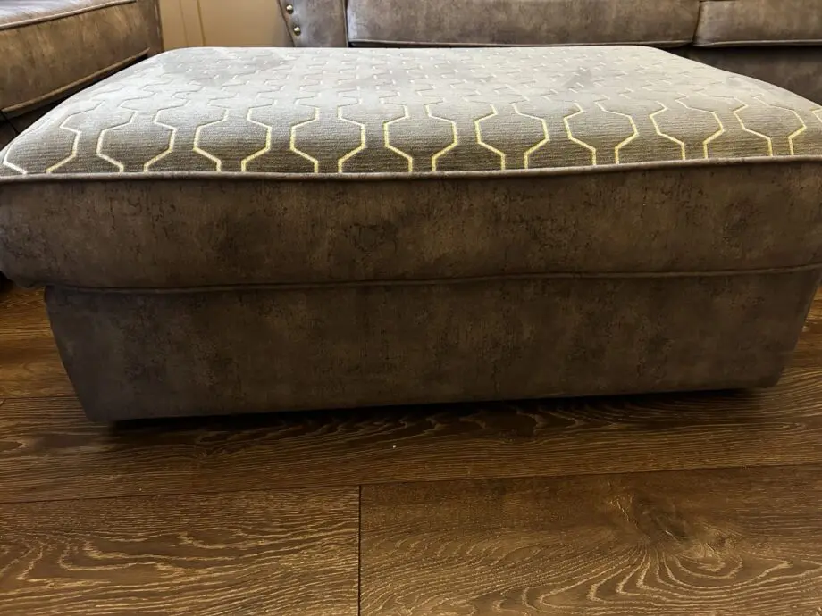 Paisley grey studded sofas and Banquet foot stall