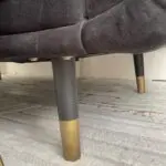 TOV Furniture two seater black suede sofa with gold legs