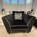 DFS Black crushed velvet 3 seater sofa Bed with arm chair and footstall