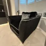 DFS Black crushed velvet 3 seater sofa Bed with arm chair and footstall