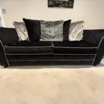 DFS Black crushed velvet 3 seater sofa Bed with arm chair and footstall