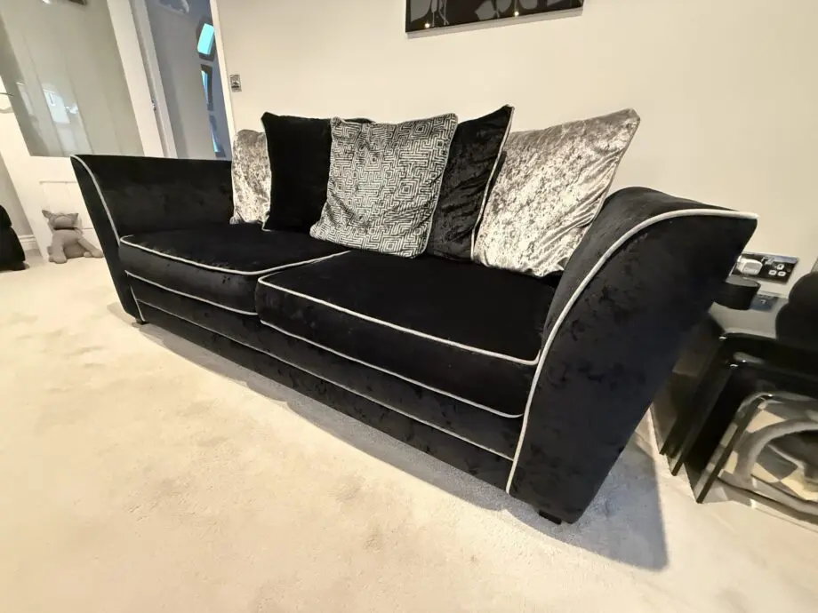 DFS Black crushed velvet 3 seater sofa Bed with arm chair and footstall