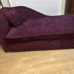 Dark red chaise-longue sofa bed