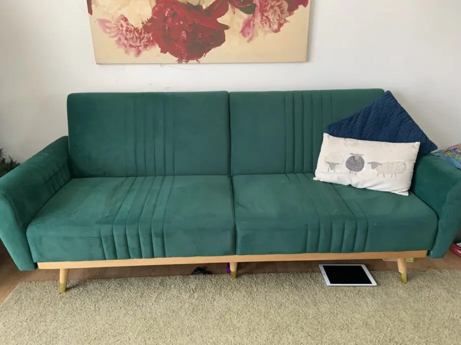 Dark grey velvet sofa bed