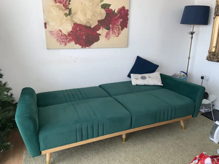 Dark grey velvet sofa bed