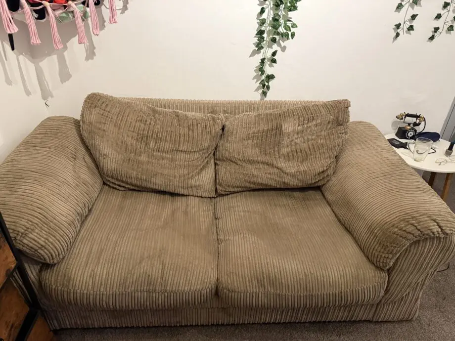 Beige/Brown two seater sofa