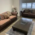 Large DFS 3 seater leather and fabric sofa