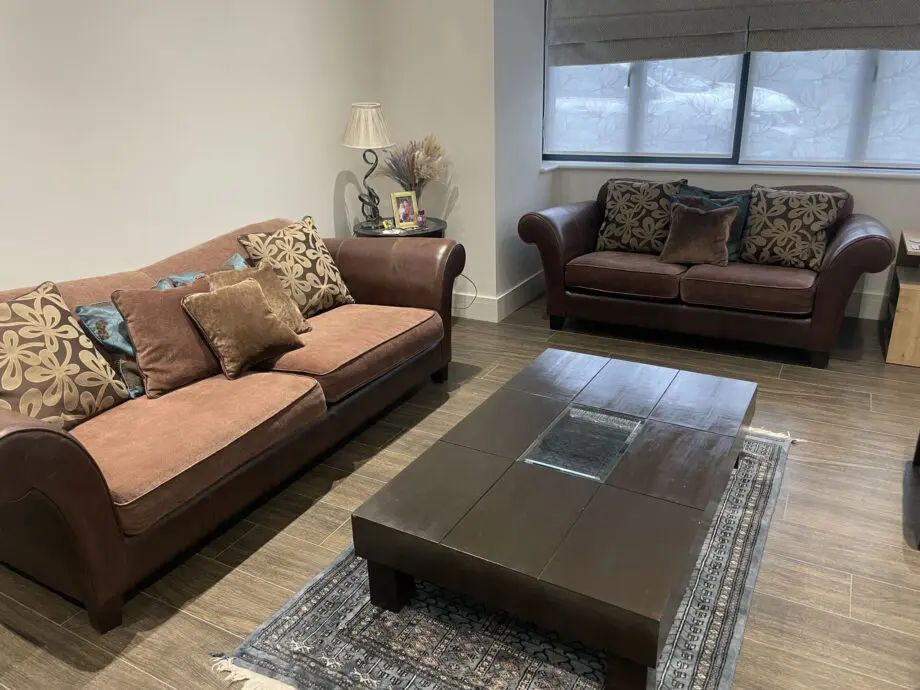 Large DFS 3 seater leather and fabric sofa