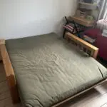 Futon Company Vienna oak sofa bed in olive green