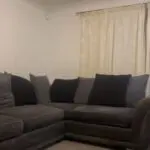 DFS Grey & Black pillow back corner sofa