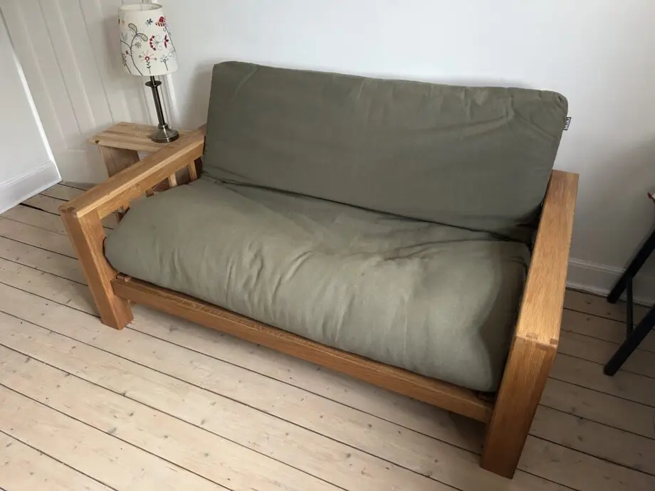 Futon Company Vienna oak sofa bed in olive green