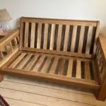 Futon Company Vienna oak sofa bed in olive green