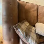 DFS brown 2 seater Pillow Back sofa with footstool