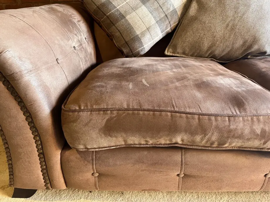 DFS brown 2 seater Pillow Back sofa with footstool