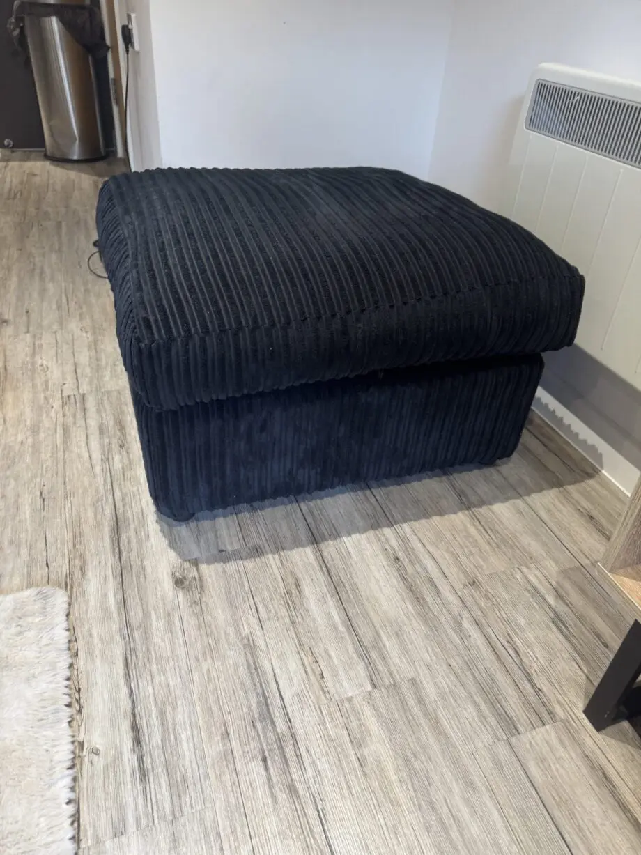 Black L shaped corner sofa