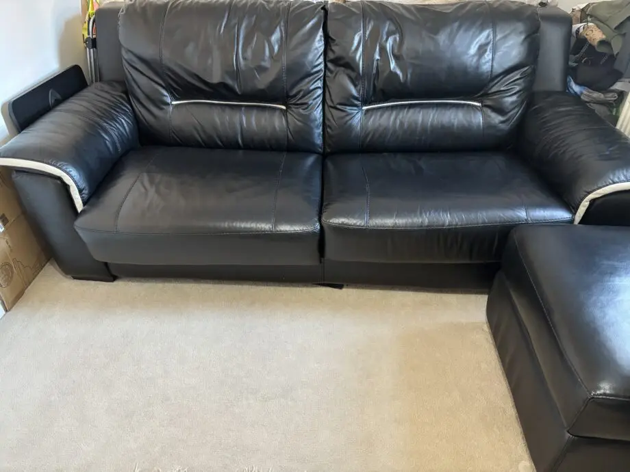 Harveys Brown leather sofa bed and footstool
