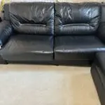 Harveys Brown leather sofa bed and footstool