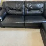 Harveys Brown leather sofa bed and footstool