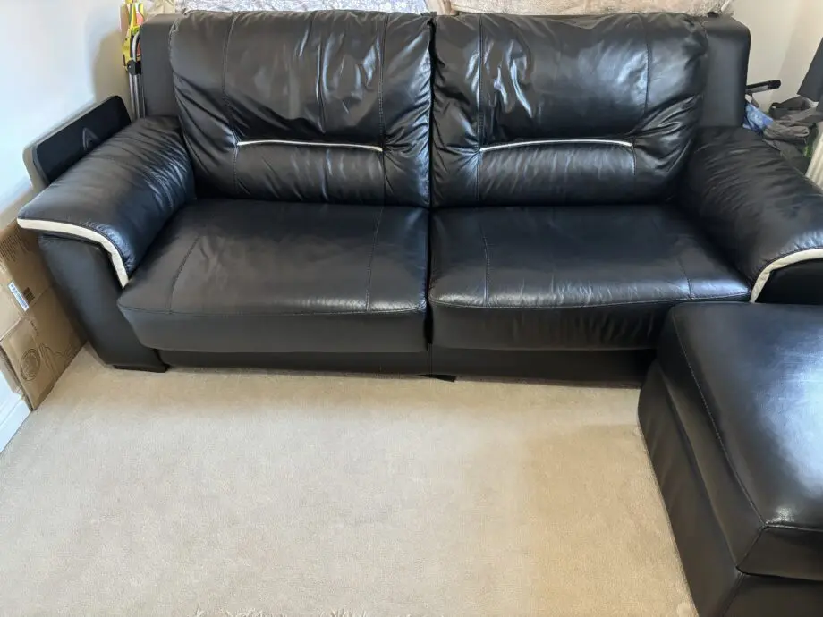 Harveys Brown leather sofa bed and footstool