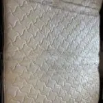 Harveys Brown leather sofa bed and footstool